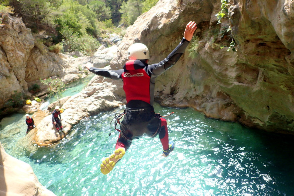 Diving into a canyon pool